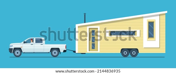 A pickup truck with a man at the wheel is\
towing a tiny house. Vector\
illustration.