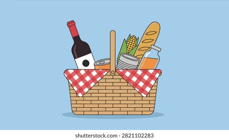 Picnic basket filled with fresh bread, corn, bottled juice and red wine sitting on a light blue background surface for lunch.