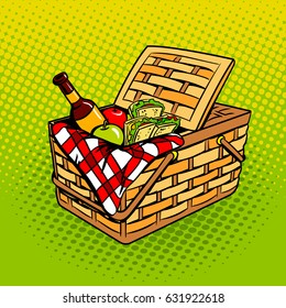 Picnic basket with food products pop art retro vector illustration. Comic book style imitation.