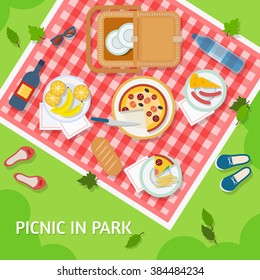 Picnic in park with a basket, food and cutlery on red gingham, top view. Flat style vector illustration. 