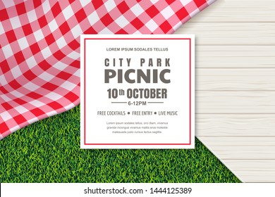 Picnic poster or banner design template. Vector background with realistic red gingham plaid or tablecloth, white wooden table and green grass lawn. Restaurant, cafe menu design elements.