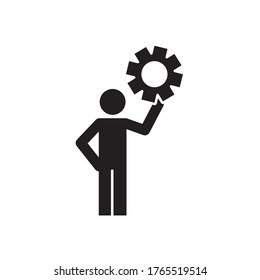 pictogram man holding a gear wheel icon over white background, silhouette style, vector illustration