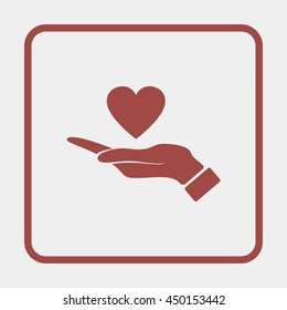 Pictograph of heart in hand.