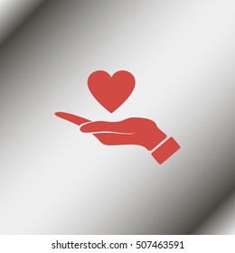 Pictograph of heart in hand.