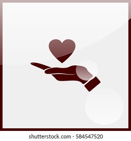 Pictograph of heart in hand.