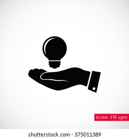 Pictograph of light bulb icon in hand