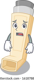 A picture of asthma inhaler showing afraid look face