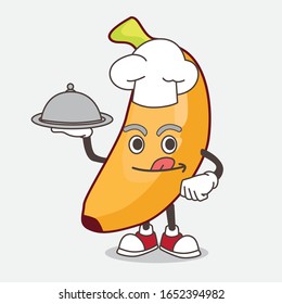 A picture of banana cartoon mascot character as a Chef with food on tray ready to serve