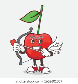 A picture of bing cherry cartoon mascot character Cupid with arrow and wings