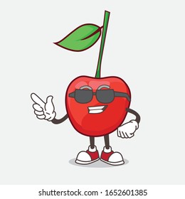 A picture of bing cherry mascot character wearing black glasses