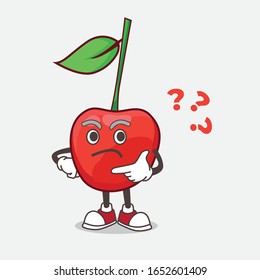 A picture of bing cherry mascot character in a confused gesture
