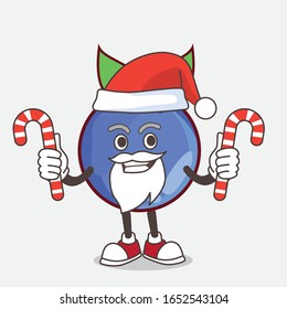 A picture of blueberry cartoon mascot character in Santa costume with candy