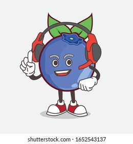 A picture of blueberry cartoon mascot character speaking on a headphone