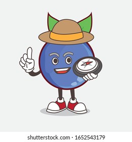 A picture of blueberry cartoon mascot character having a compass