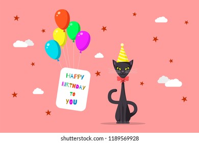 Picture of cute cat with colored baloons