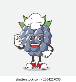 A picture of dewberry cartoon mascot character in a chef dress and white hat