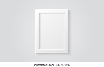 Picture frame isolated on a wall. White color. Realistic modern template. A4 vertical format. Mock up for pictures or photo. Beautiful minimal clean design. Eps 10 vector illustration.