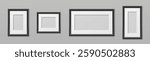 Picture frame mockups with black borders of various sizes and proportions - horizontal and vertical rectangular, square. Empty photo templates on gray wall for portfolio or gallery presentations.