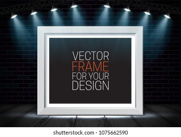 Picture frame on a brick wall background illuminated by spotlights. Vector template for your presentations.