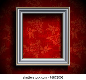 Picture frame on grunge wall, vintage background.