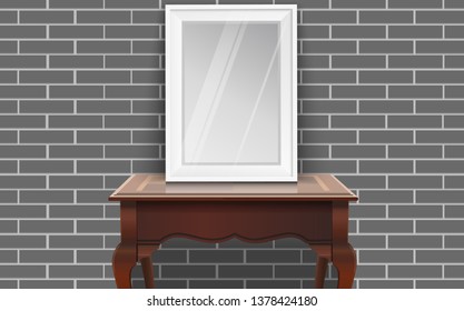 picture frame on the woonden table at the brick wall