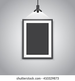 picture frame under light lamp