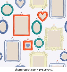 Picture frames hanging on the wall seamless pattern - light background.