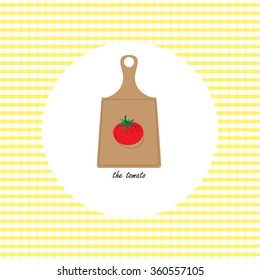 Picture of fruit and vegetables on the cutting board. The tomato.
