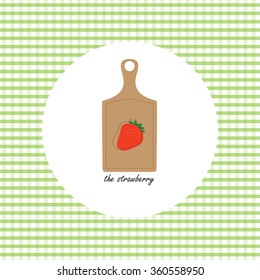 Picture of fruit and vegetables on the cutting board. The strawberry.