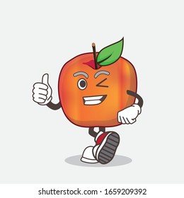 A picture of Honeycrisp Apple cartoon mascot character making Thumbs up gesture