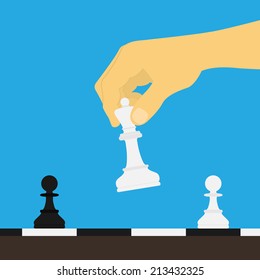 Picture Of Human Hand Holding Chess Figure Above The Board