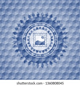 picture icon inside blue emblem with geometric background.