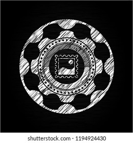 picture icon inside chalkboard emblem