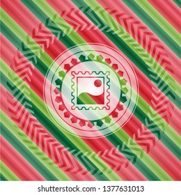 picture icon inside christmas colors style emblem.