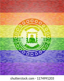 picture icon inside emblem on mosaic background with the colors of the LGBT flag
