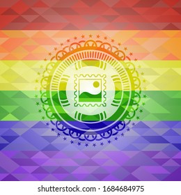 picture icon inside emblem on mosaic background with the colors of the LGBT flag