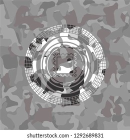 picture icon inside grey camouflaged emblem