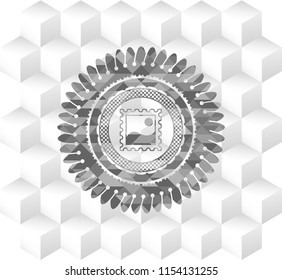 picture icon inside grey emblem with cube white background