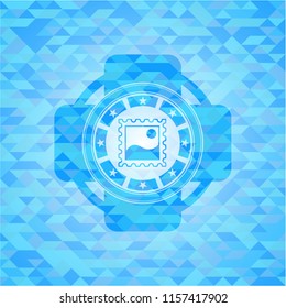 picture icon inside light blue mosaic emblem