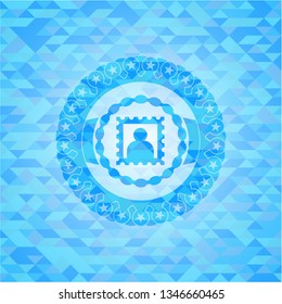 picture icon inside light blue emblem with mosaic background