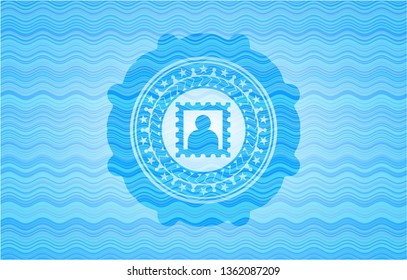 picture icon inside light blue water wave emblem background.