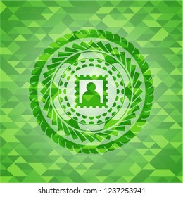 picture icon inside realistic green mosaic emblem