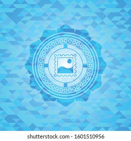 picture icon inside realistic light blue mosaic emblem