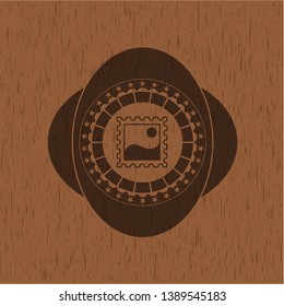 picture icon inside realistic wooden emblem