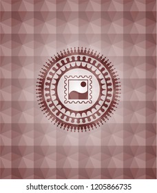 picture icon inside red seamless badge with geometric pattern.