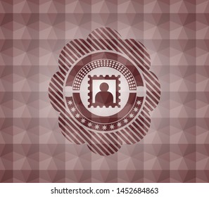 picture icon inside red seamless emblem with geometric background.