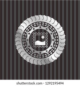 picture icon inside silver emblem or badge