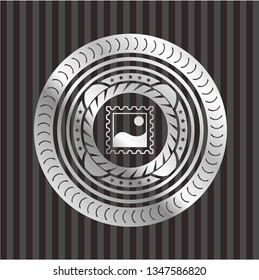 picture icon inside silvery emblem or badge