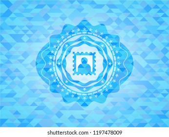 picture icon inside sky blue emblem. Mosaic background