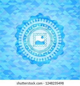 picture icon inside sky blue mosaic emblem
